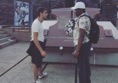 Learning about the Soweto uprising at the Hector Pieterson Memorial with Tourist Guide Sibusiso Mhlanga
