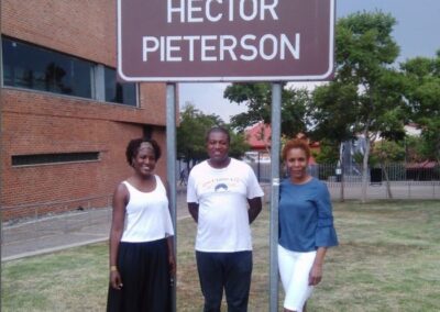 Visitors being shown around the Hector Pieterson precinct in Soweto by Tourist Guide Sibusiso Mhlanga